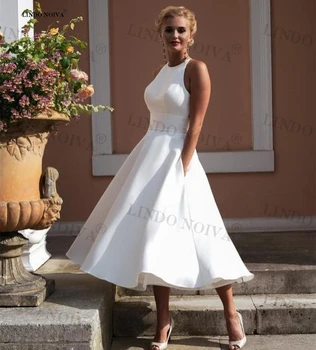 לינדו NOIVA Vestidos בהזמנה אישית קצרה O-צוואר קו A-עם כיס אלגנטי ללא שרוולים באורך הברך שמלות כלה свадебное платье