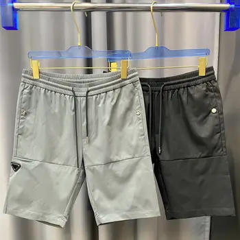 CINESSD הקיץ דק כמשי גברים של מכנסיים קצרים 2023Fashion אישיות סימן המשולש מזדמן החמישי מכנסיים של גברים תכליתי התיכון המכנסיים